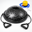 Black balance trainer showing textured dome, resistance bands and pump