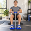 Man using a spring grip strengthener with foot pedals